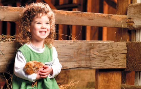 little girl on a farm
