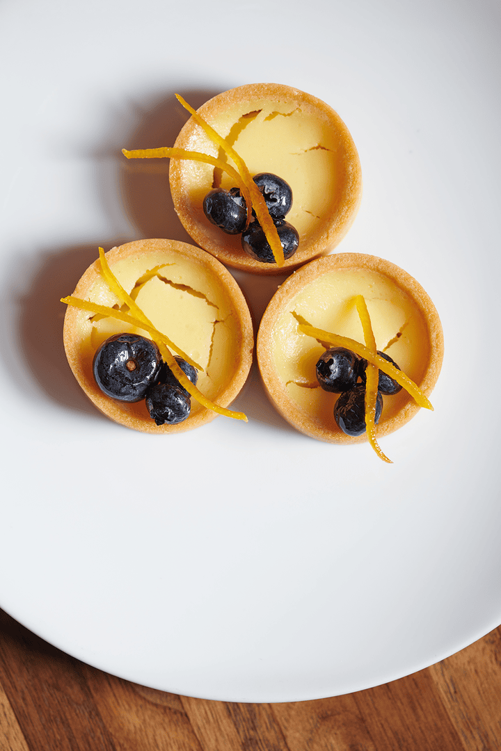 Centro’s lemon tartlet with blueberries and candied oranges
