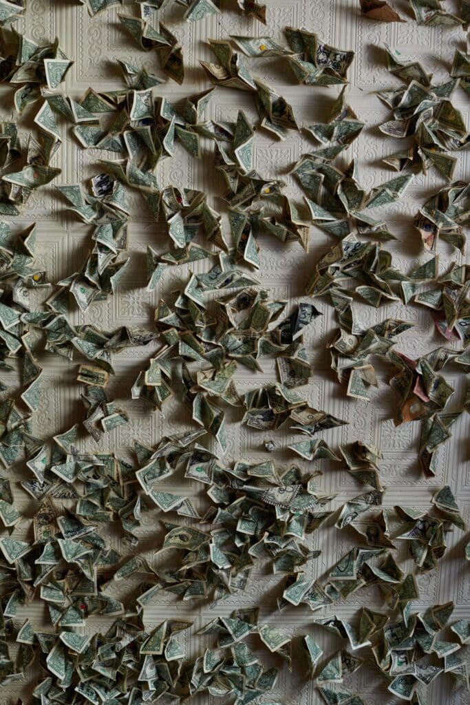 Folded bills decorate the bar ceiling. Photo by Shea Evans