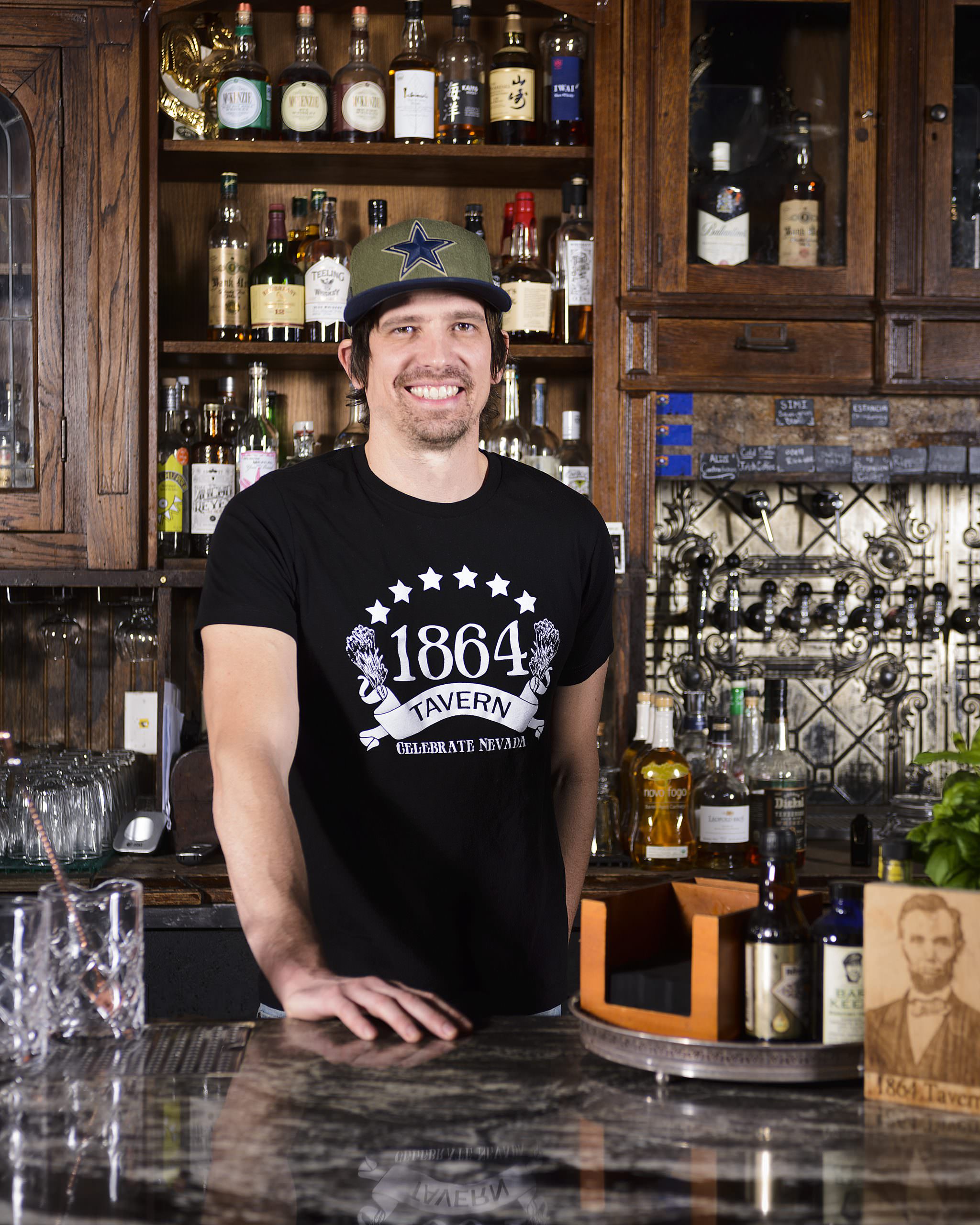 Dylan Evans, Co-Owner of 1864 Tavern in Reno behind the bar