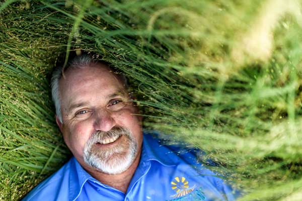 John Getto, co-owner of Desert Oasis Teff & Grain, in one of his teff fields in Fallon. Photo by Candice Vivien