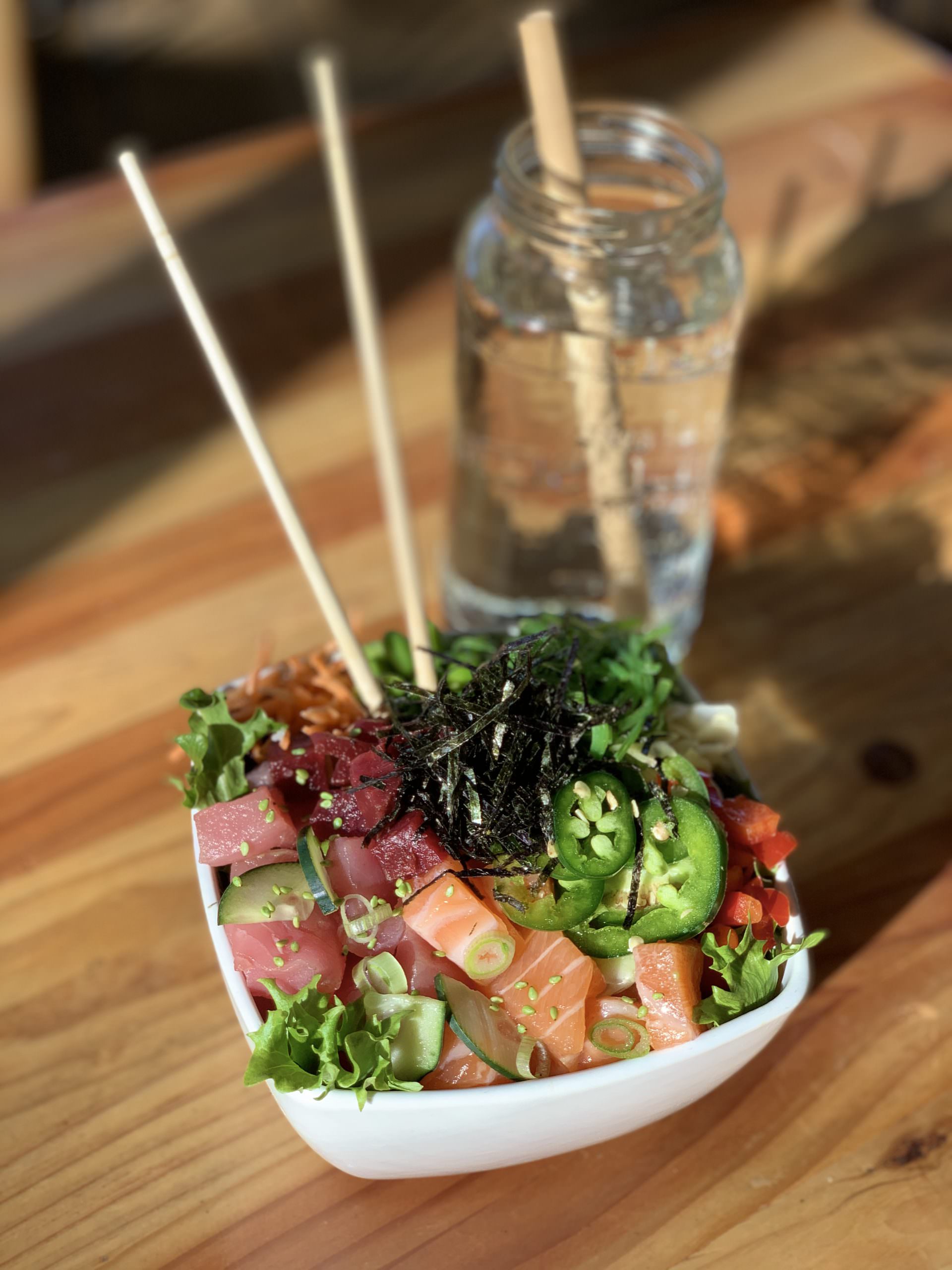 Pola's Hawaiian poke bowls are chock full of omega 3-rich fresh fish and vibrant vegetables, making it an easy, healthy meal to grab on the go. Photo courtesy of Pola Poke