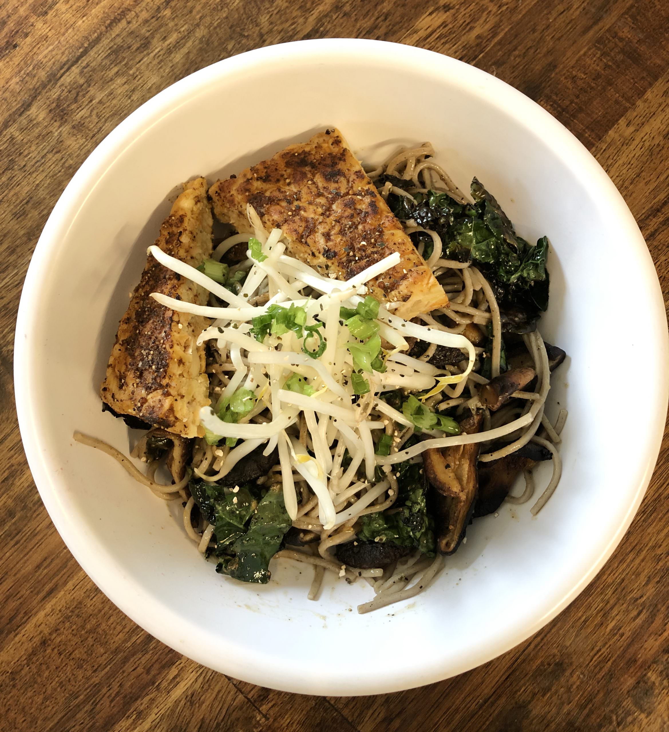 Soba noodle stir fry with tempeh (stir fry sauce, shiitake mushrooms, sautéed onion, kale, bean sprouts, cashews, sesame seeds, scallions) from The Station in Truckee. Photo courtesy of Grace Burnes at The Station