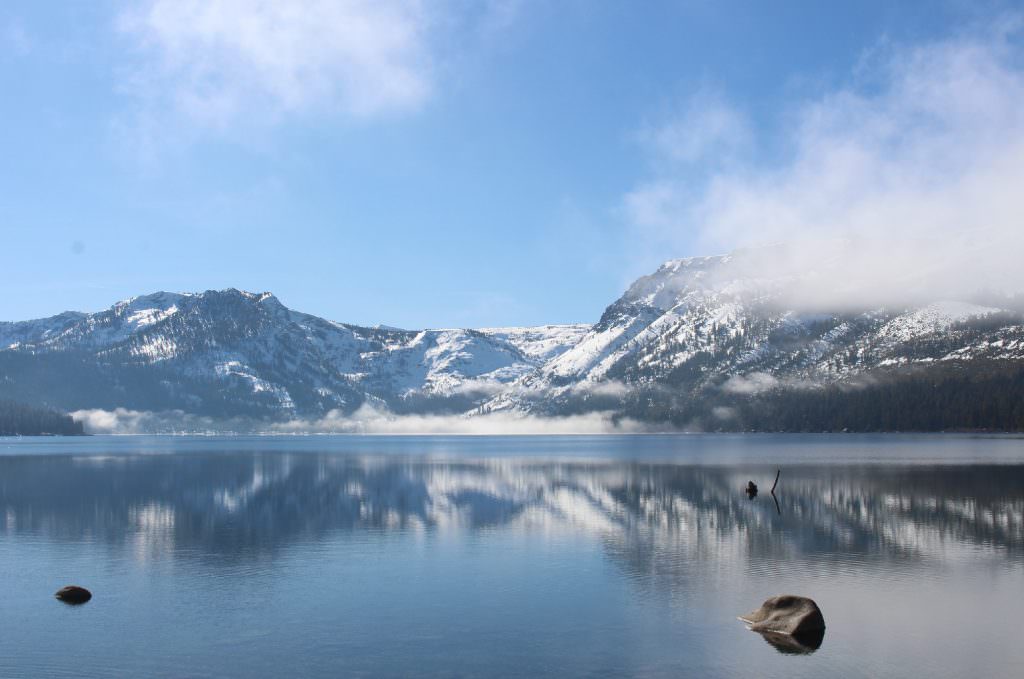 Fallen Leaf Lake is a picturesque location for snowshoeing - lake view with snowcapped mountains in background