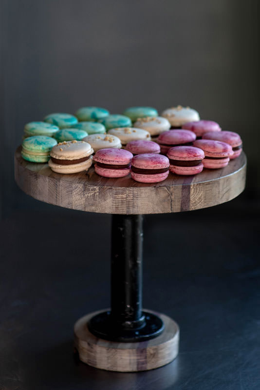 Selection of colorful iridescent French macarons prepared by Kirsch and Rinaldi