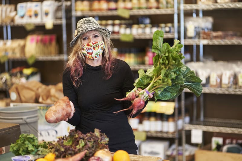 Priya Hutner of The Seasoned Sage shops for ingredients at Tahoe Food Hub as part of her meal preparation services. Photo by Wade Snider