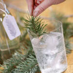 A bottle of Douglas Fir simple syrup prepared by Brooke Walshaw, with a hand stamped gift tag. Photo by Lou Manna