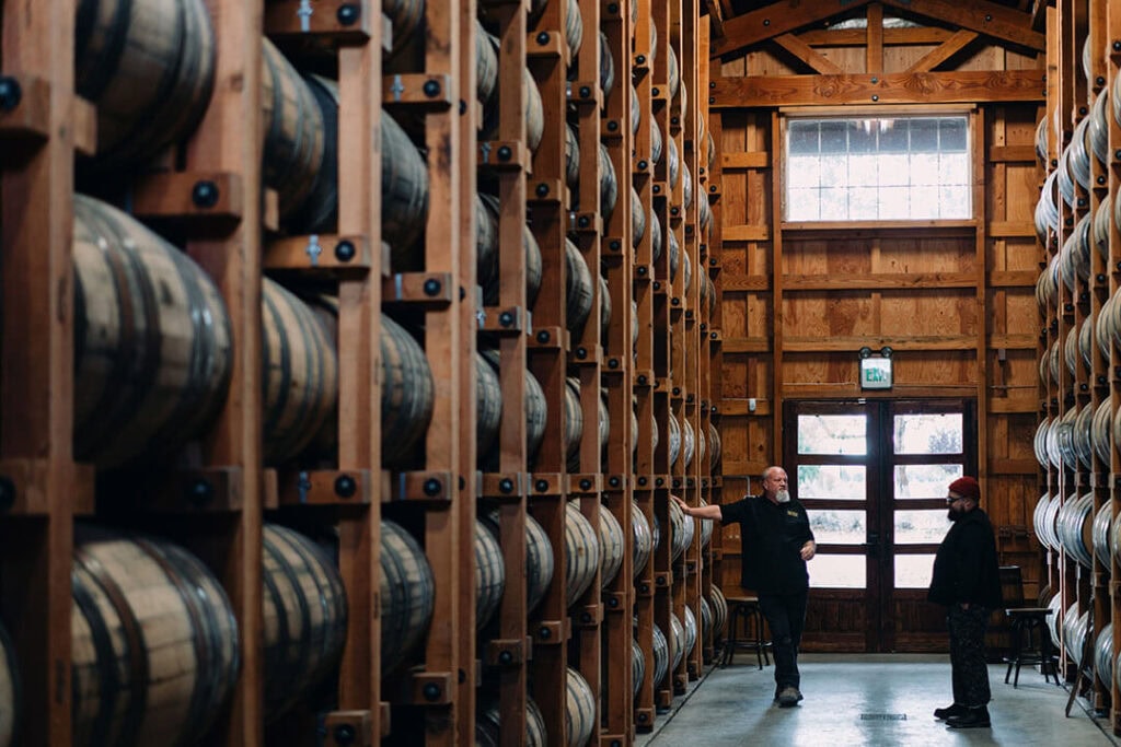 Frey Ranch master distiller Russell Wedlake and writer Michael Moberly explore the distillery's barrel rackhouse, where whiskey for the single-barrel program is aged