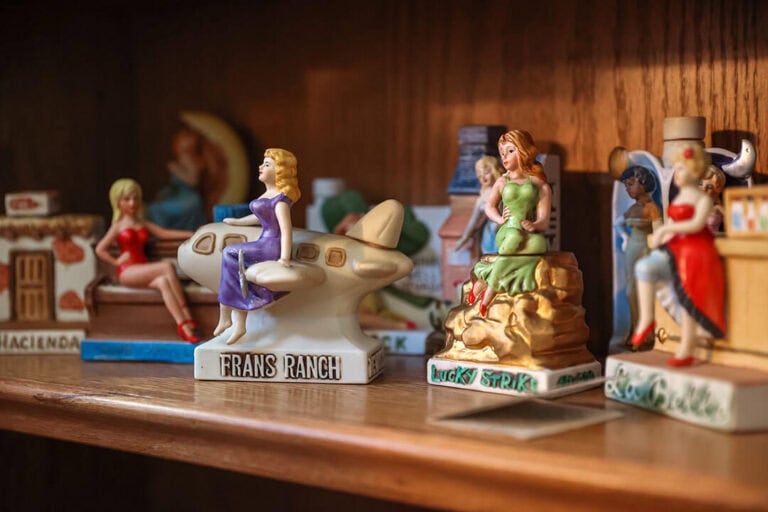 Collector John Totten of Reno has two complete sets of Dug Picking's brothel decanters, which featured curvy, attractive women. Photo by Shaun Hunter