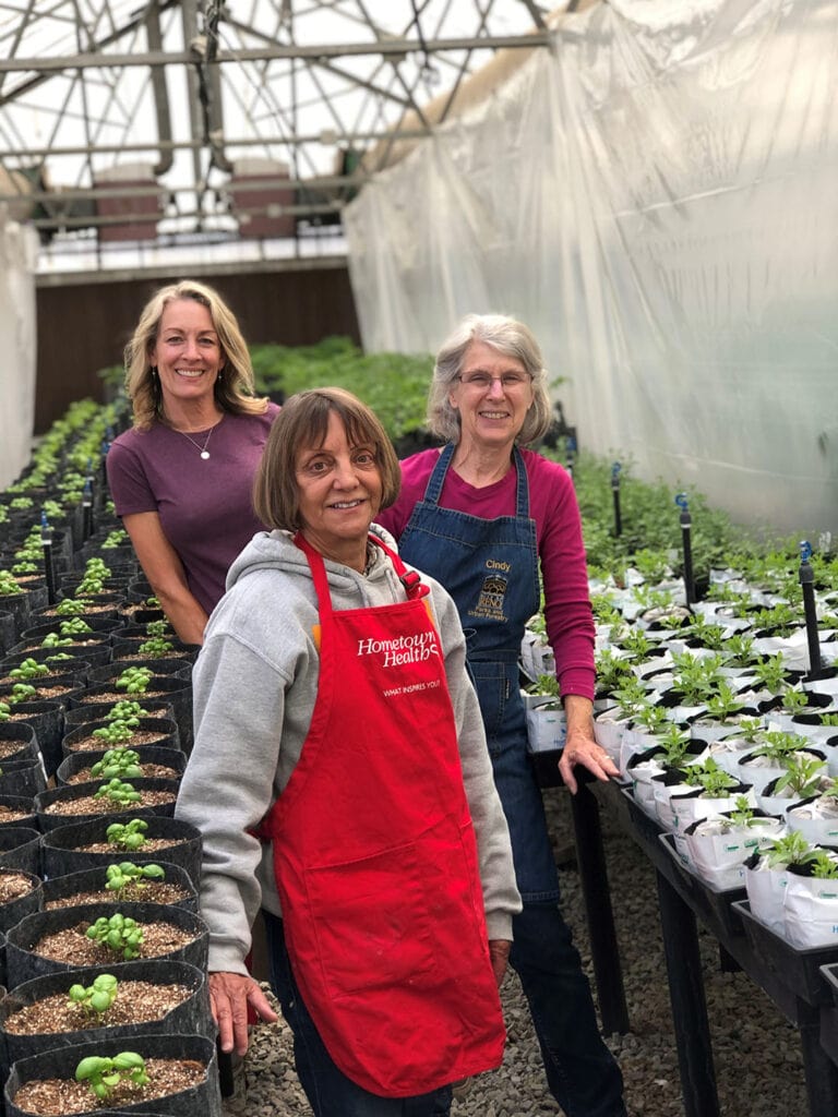 Master gardeners in the University of Nevada, Reno Extension greenhouse. Photo courtesy of University of Nevada, Reno Extension