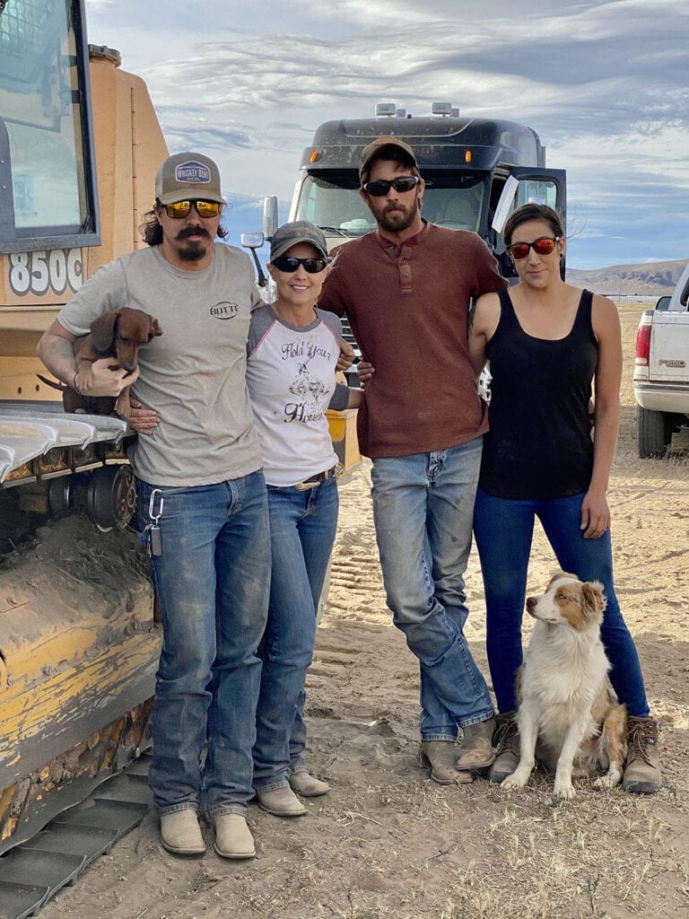 From left, Quinn Thompson, Andrea Traphagan, Torin Thompson, and Amanda Klenk put in wheat fields in April 2020