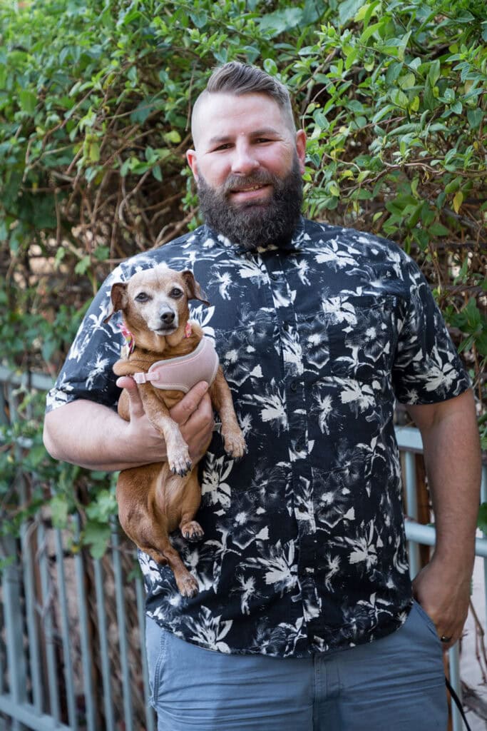 Trevor Leppek, owner of Pignic Pub & Patio in Reno, with his dog, Annika. Photos by Olga Miller