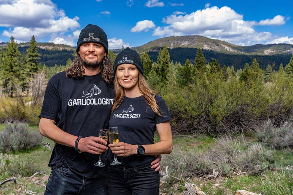 Lusson and Burton toast their businessโ expansion in front of Penman Peak in Plumas County