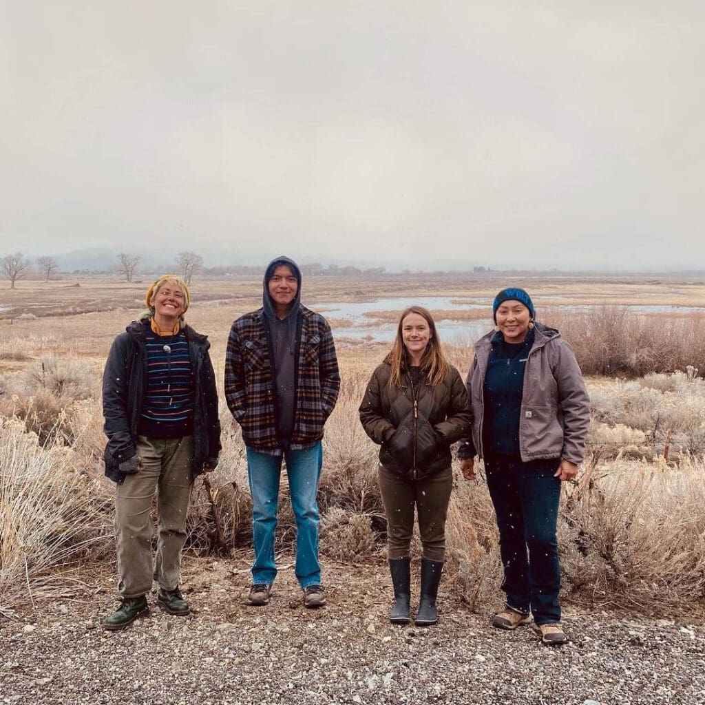 In Carson Valley, a group of young people from UNR's Desert Farming Initiative collect cuttings to propagate shrubs of cultural importance to Native Americans. From left: Assistant farm manager Claire Holden, food sovereignty intern Lance Owyhee, food sovereignty intern Chauntelle Murphy, and environmental specialist Cara James Denetsosie. Photo courtesy of Madison Foley