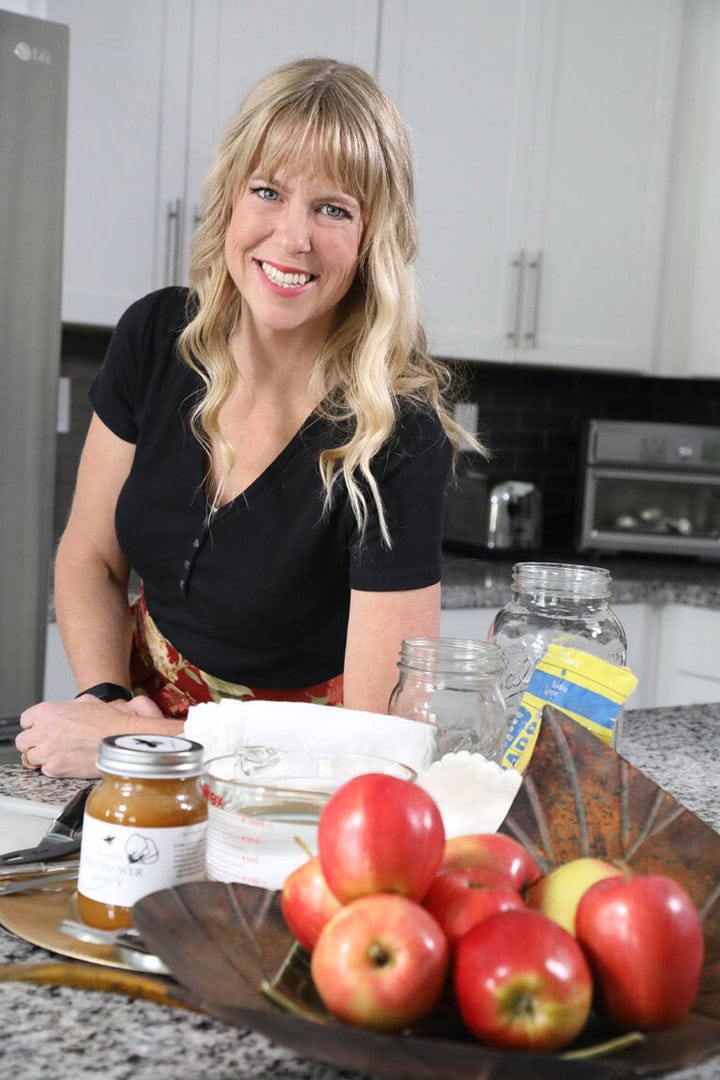 Holistic nutritionist Carly Neubert prepares the ingredients she needs for making apple cider vinegar