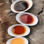 Handmade vinegars prepared by The Fermentation School's co-founder, Kirsten Shockey. Photo courtesy of Shockey