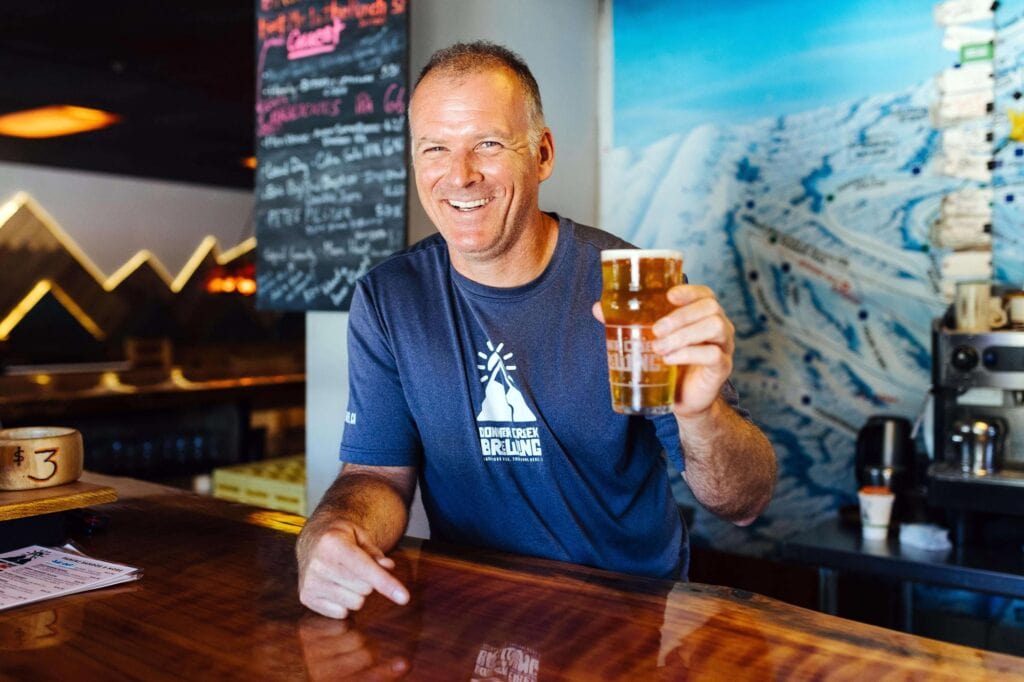 Speicher raises a glass of one of his brews