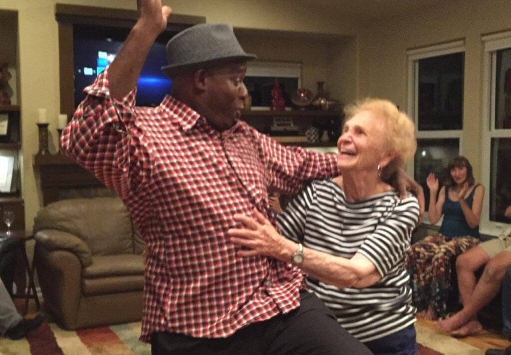Miguel Cuni, Jr., a salsa music legend from Cuba, dances with Norma