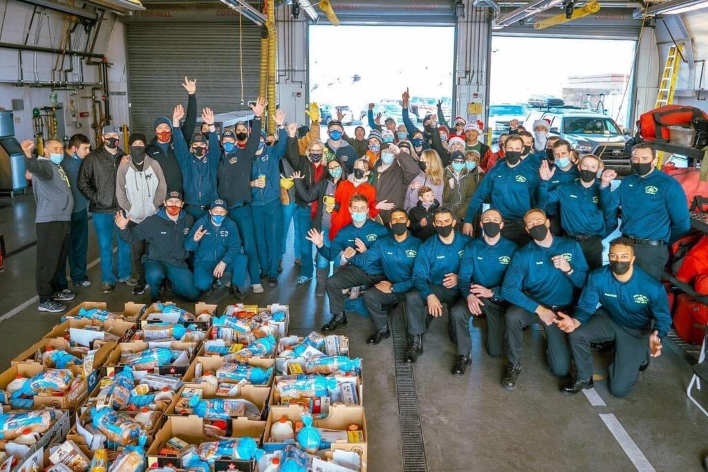 Current and former Reno Fire employees and their families gathered December 18, 2021, at Fire Station 21 to take part in the 89th Sam Saibini Christmas Food Basket Program