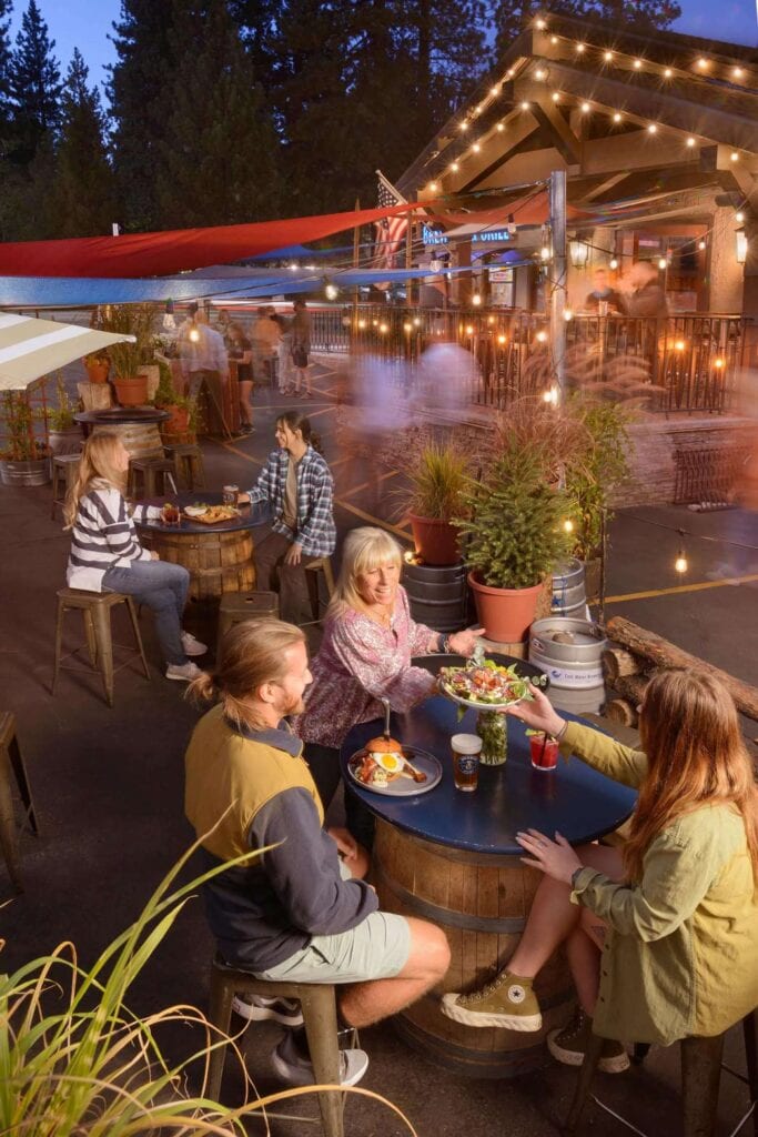 Owner Debbie Brown serves customers outdoors at Cold Water Brewery & Grill in South Lake Tahoe