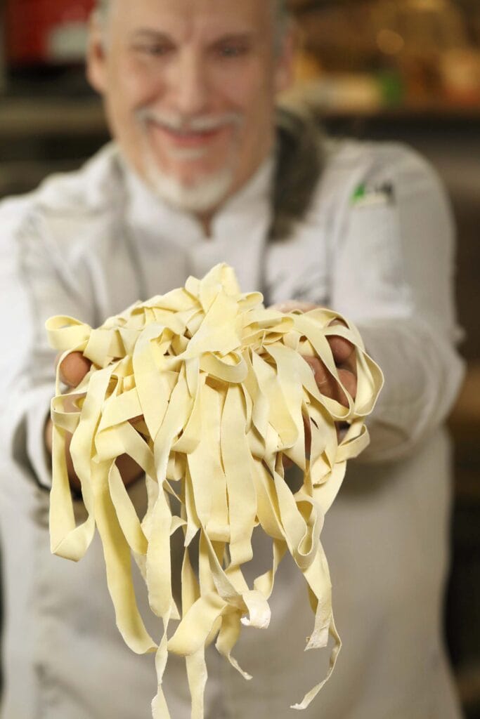 Ivano Centemeri — vice president Northern Nevada executive chef, Eldorado Resort Casino in Reno and Harveys and Harrah’s Lake Tahoe — presents handmade tagliatelle in the Eldorado pasta shop in Reno. Photo by Lou Manna