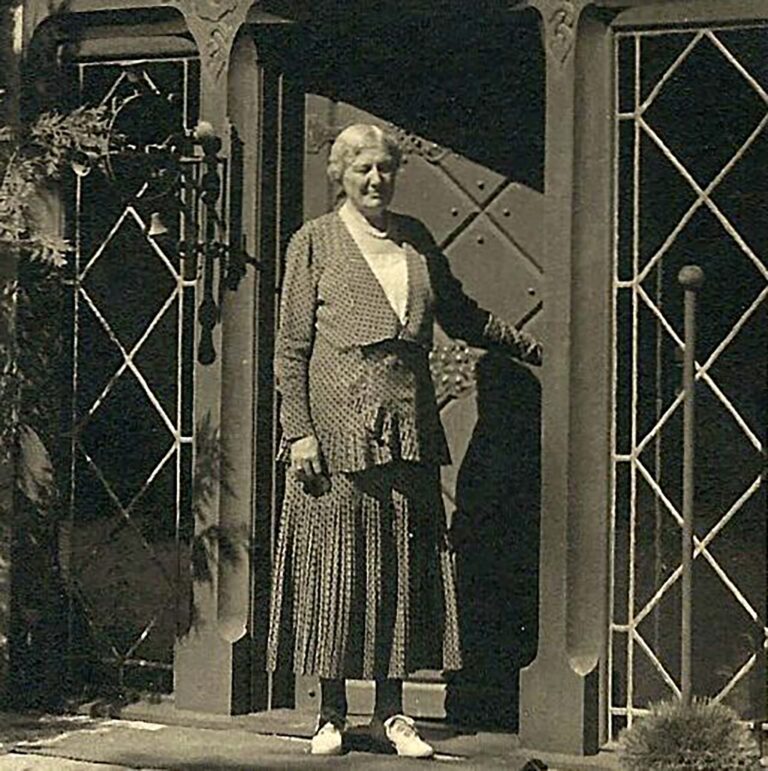 Lora Josephine Knight stands at the door at Vikingsholm. Photo courtesy of Vikingsholm.com
