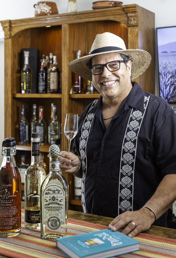 Javier Gil shares some of his favorite tequilas at the bar in his Reno home