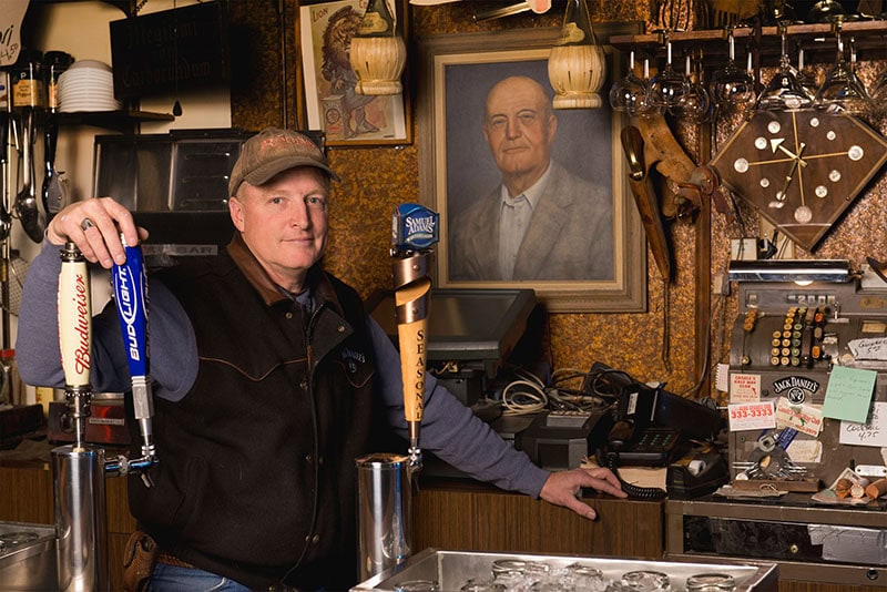 Owner Doug Quilici stands behind the bar at the Copenhagen.