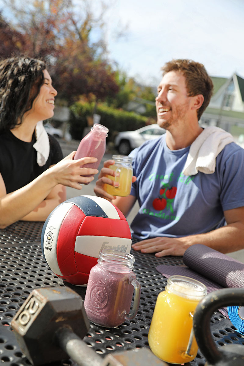 Anielka Mankel and Kellan Flanagan rehydrate after a workout with their favorite natural drinks from Great Full Gardens.