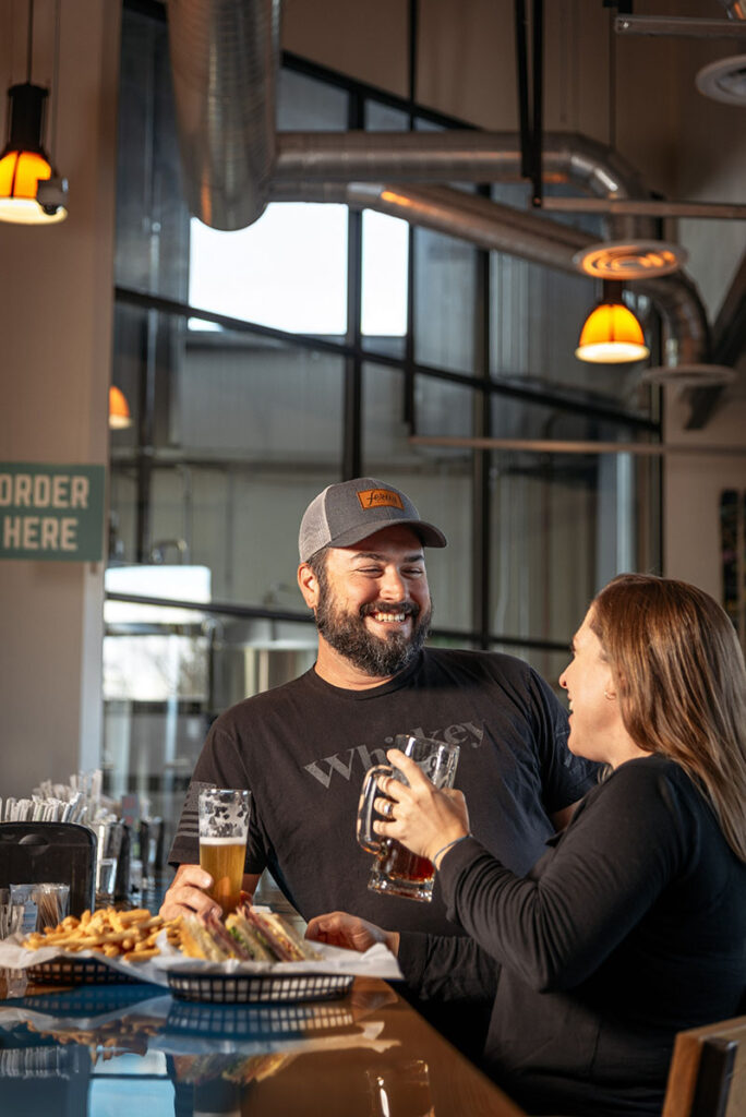 Jim and Kristy Phillips enjoy food and beer at Schüssboom Brewing Co.