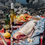 A native meal featuring Lahontan cutthroat trout, fry bread, and rice prepared by Beverly Harry. Photo by Donna Victor
