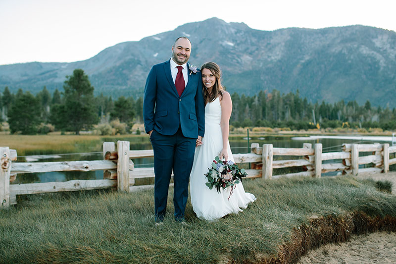 Newlyweds Kaylan Worley and Kristi Simmons. Dress by Fabulous Frocks. Hair and makeup by RAH Hair Studio. Florals by Etsy. Photo by Courtney Aaron