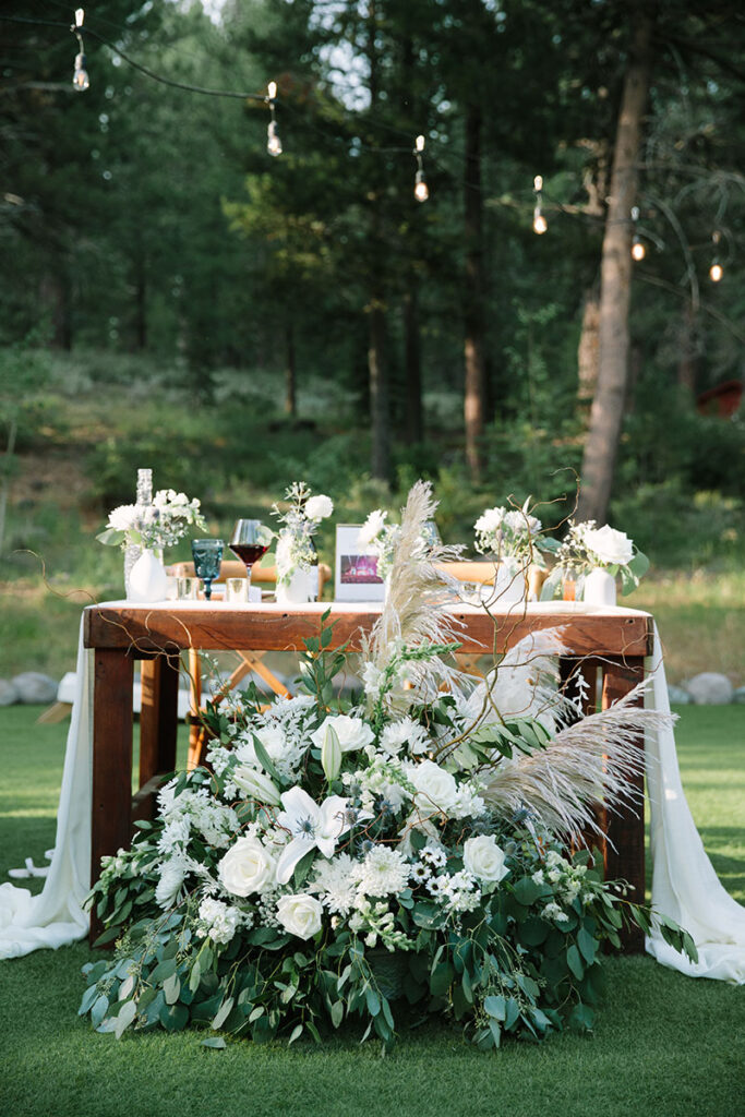 Tablescape at the wedding of Nina Wingert and Jordan Prenshaw at Dancing Pines. Planning by Revel & Rye Event Co. Catering by Blend Catering. Flowers by Devonwoods. Photo by Courtney Aaron