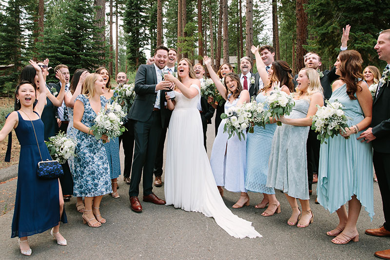 Newlyweds Jordan Prenshaw and Nina Wingert celebrate their nuptials at Dancing Pines. Planning by Revel & Rye Event Co. Florals by Devonwoods. Dress by Kinsley James Bridal. Photo by Courtney Aaron