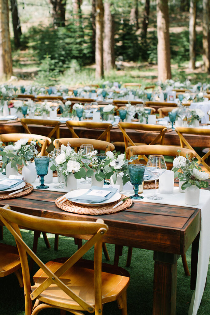 The wedding reception for Nina Wingert and Jordan Prenshaw at Dancing Pines. Planning by Revel & Rye Event Co. Catering by Blend Catering. Florals by Devonwoods. Photo by Courtney Aaron