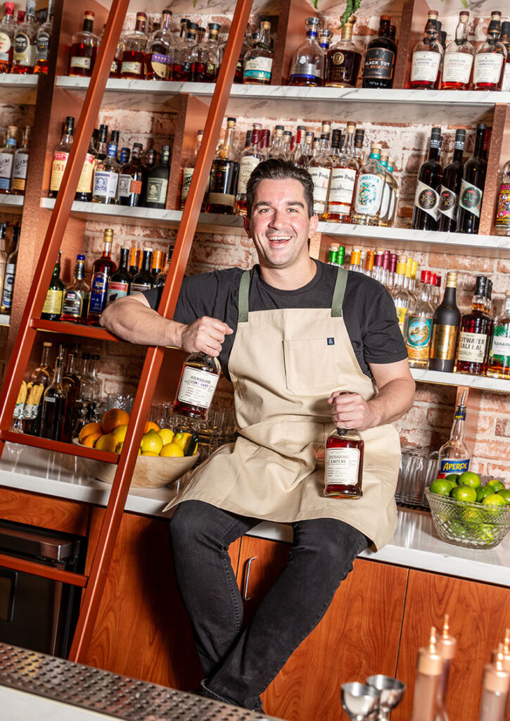 Loren DeVincenzi, co-owner and general manager, serves some coveted rums