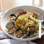 Tagliatelle aglio olio at The Kitchen Table. Photo by Shea Evans
