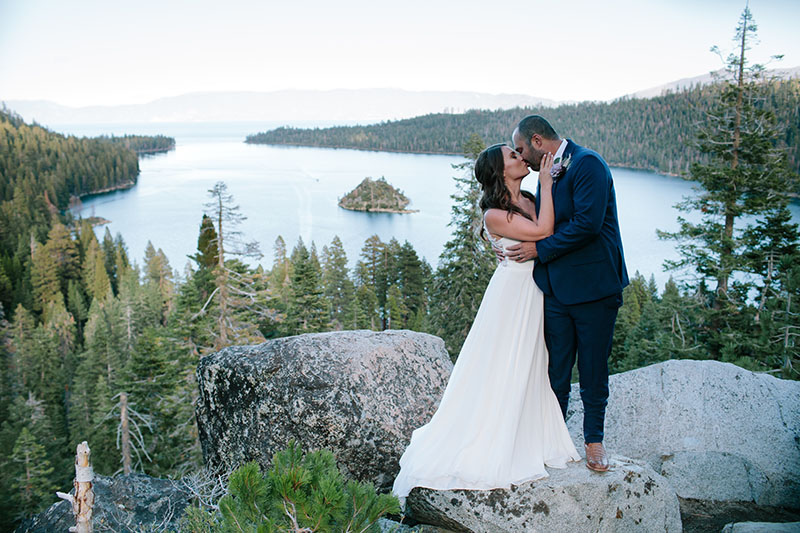 Kristi Simmons and Kaylan Worley enjoy a quiet moment after exchanging vows. Dress by Fabulous Frocks. Hair and makeup by RAH Hair Studio. Florals by Etsy. Photo by Courtney Aaron