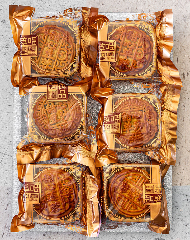 Some of Honey Bakery’s most popular mooncake flavors include (clockwise from top right) single-yolk mung bean, single-yolk red bean, green tea, white lotus seed, red bean, and mung bean