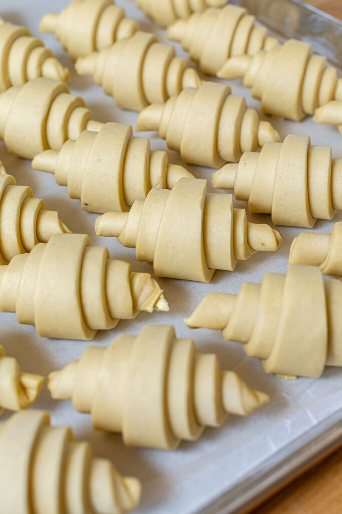 Beloved’s pastry chef, Marco Dobrescu, rolls up dough for butter croissants. Photo by Olga Miller