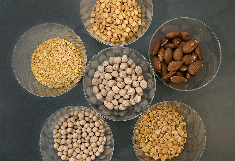 Jeyakumar displays cereals and fiber products at the UNR Extension Washoe County office. Photo by Andy Barron