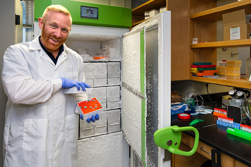 Frese holds a collection of samples culled from Nevadans around the state. Photo by Scott Thompson