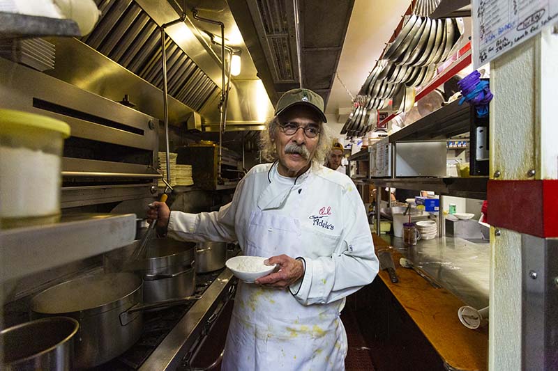 Charlie in the kitchen at Cafe at Adele’s. Photo by Kippy Spilker