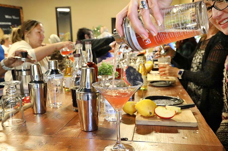 Class participants mix up poison apple martinis