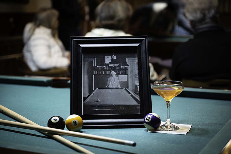 The pool room at Odeon Saloon features a photo of Mark Twain shooting pool. Here, it sits next to the cocktail named after the celebrated author