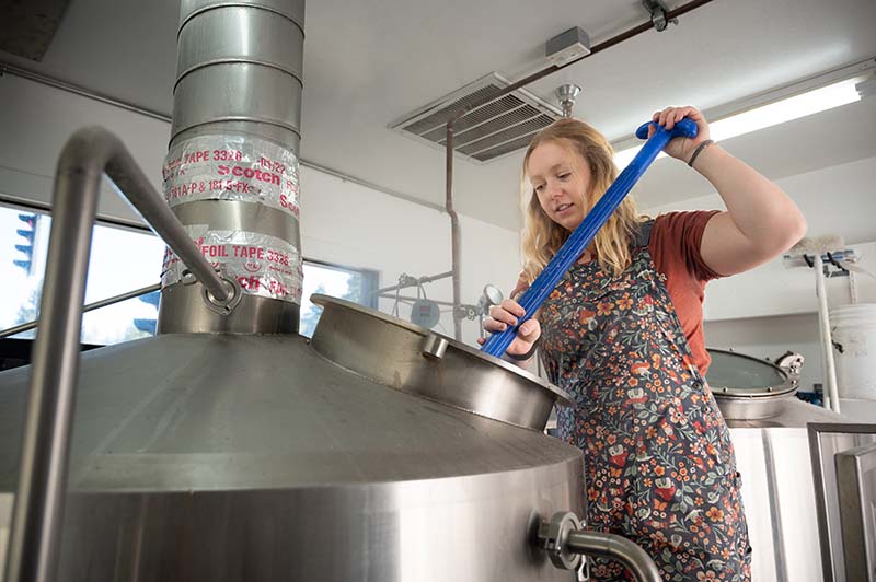 Emily Werman, head brewer at Cold Water Brewery & Grill in South Lake, checks a beer in the brewhouse