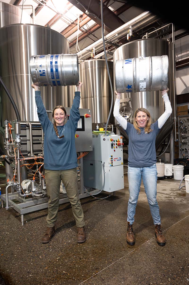 FiftyFifty Brewing Co.’s head brewer, Dana Fleming, and co-owner, Alicia Barr, in their Truckee brewery