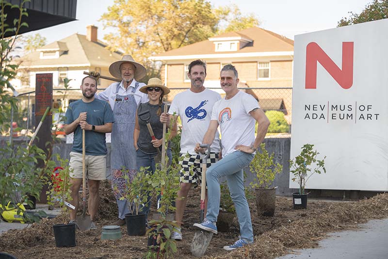 From left, Kolin Perry, Nevada Museum of Art assistant curator; Tom Stille, landscape contractor; Apsara DiQuinzio, Nevada Museum of Art senior curator; David Allen Burns, Fallen Fruit artist; and Austin Young, Fallen Fruit artist plant the Monument to Sharing art exhibit and garden at Nevada Museum of Art in Reno. Photo courtesy of Nevada Museum of Art