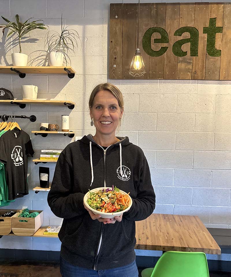 Karla Perry, co-owner of Elixir, with a signature bowl