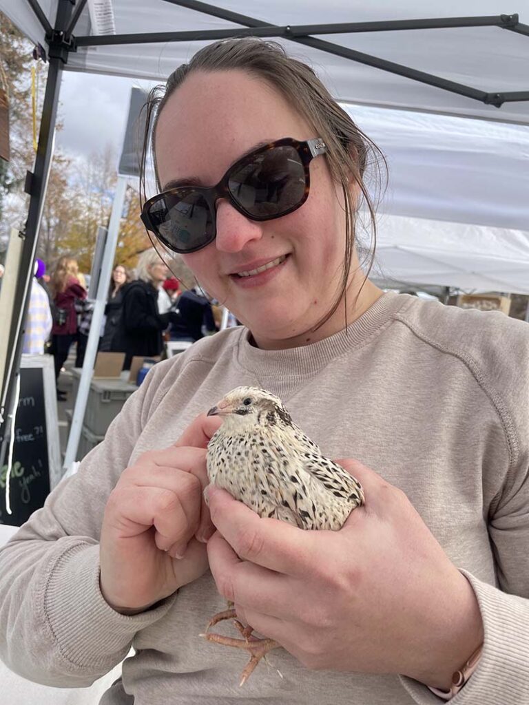 Serena Hehnke holds a quail. Photo courtesy of Seren Hehnke